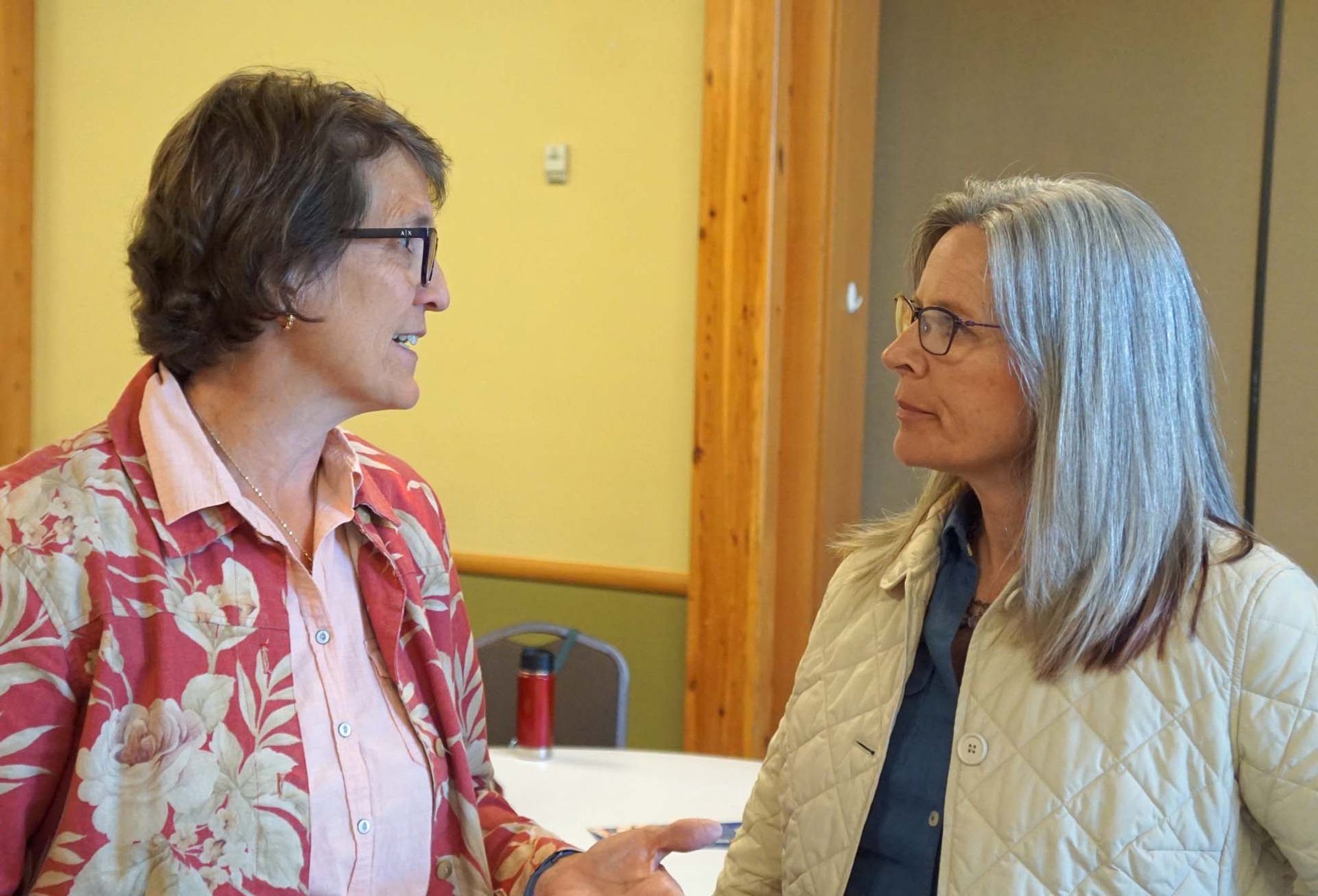   State Senate candidate Marcia Kelbon, left, chats with Jefferson County District 1 candidate Heather Dudley-Nollette at a recent forum.  