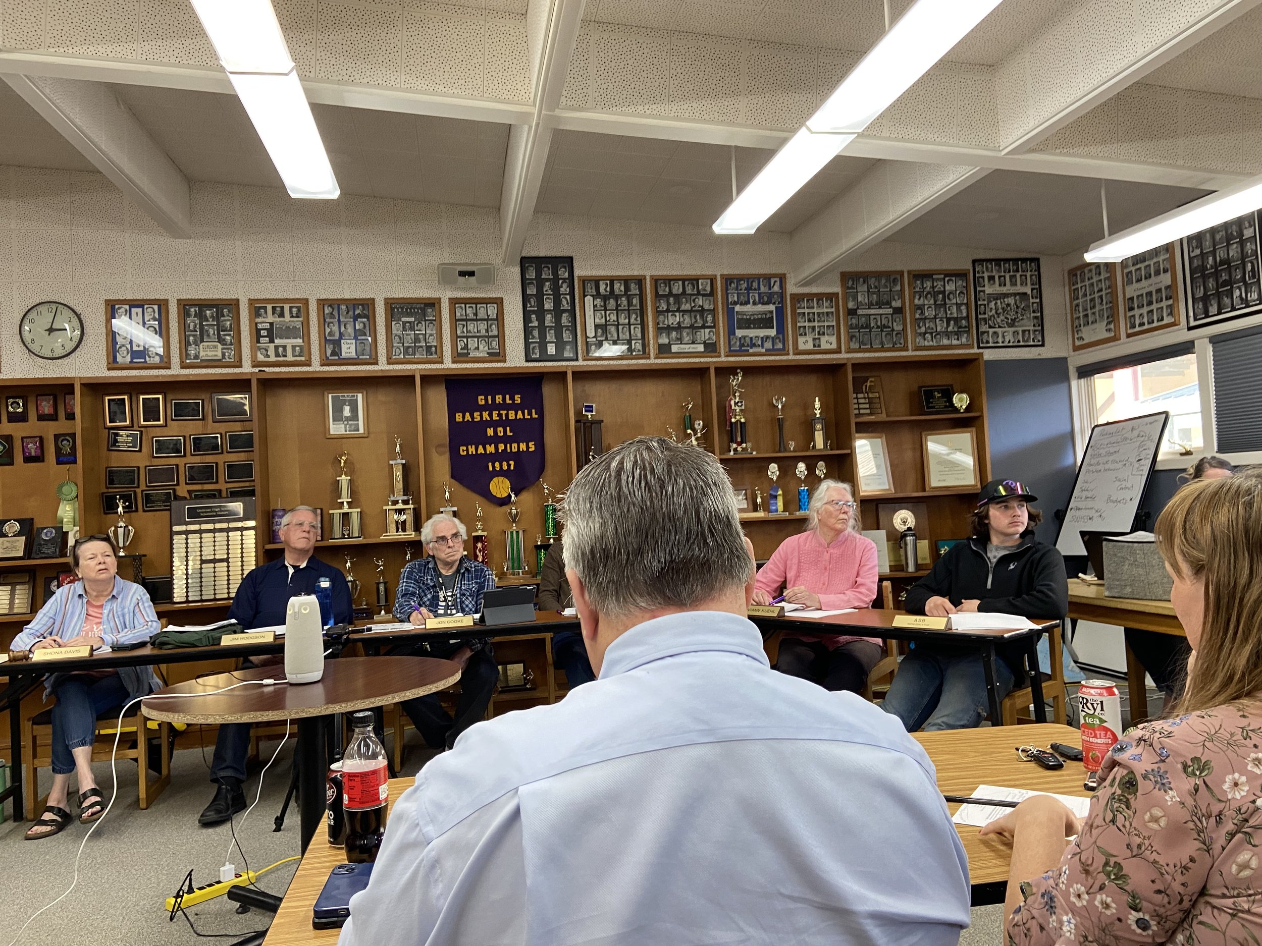   School Board members listen to public comment. Later in the meeting, they discuss amending or ending the public comment period. Photo by Nhatt Nichols.  