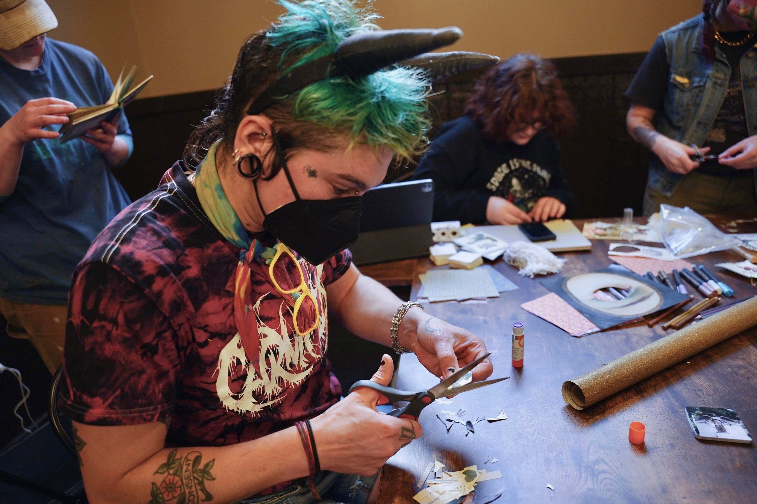   Lou Geraghty crafts in the back space of Kalma during the shop’s grand opening. Owner AJ Hawkins hopes to utilize this space for both crafts and classes. Tori Kellogg photo courtesty of Kalma  