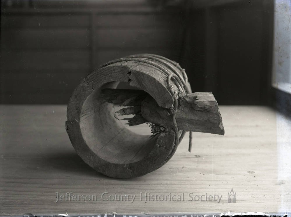   The original wooden stave piping. Photo courtesy of Jefferson County Historical Society.   