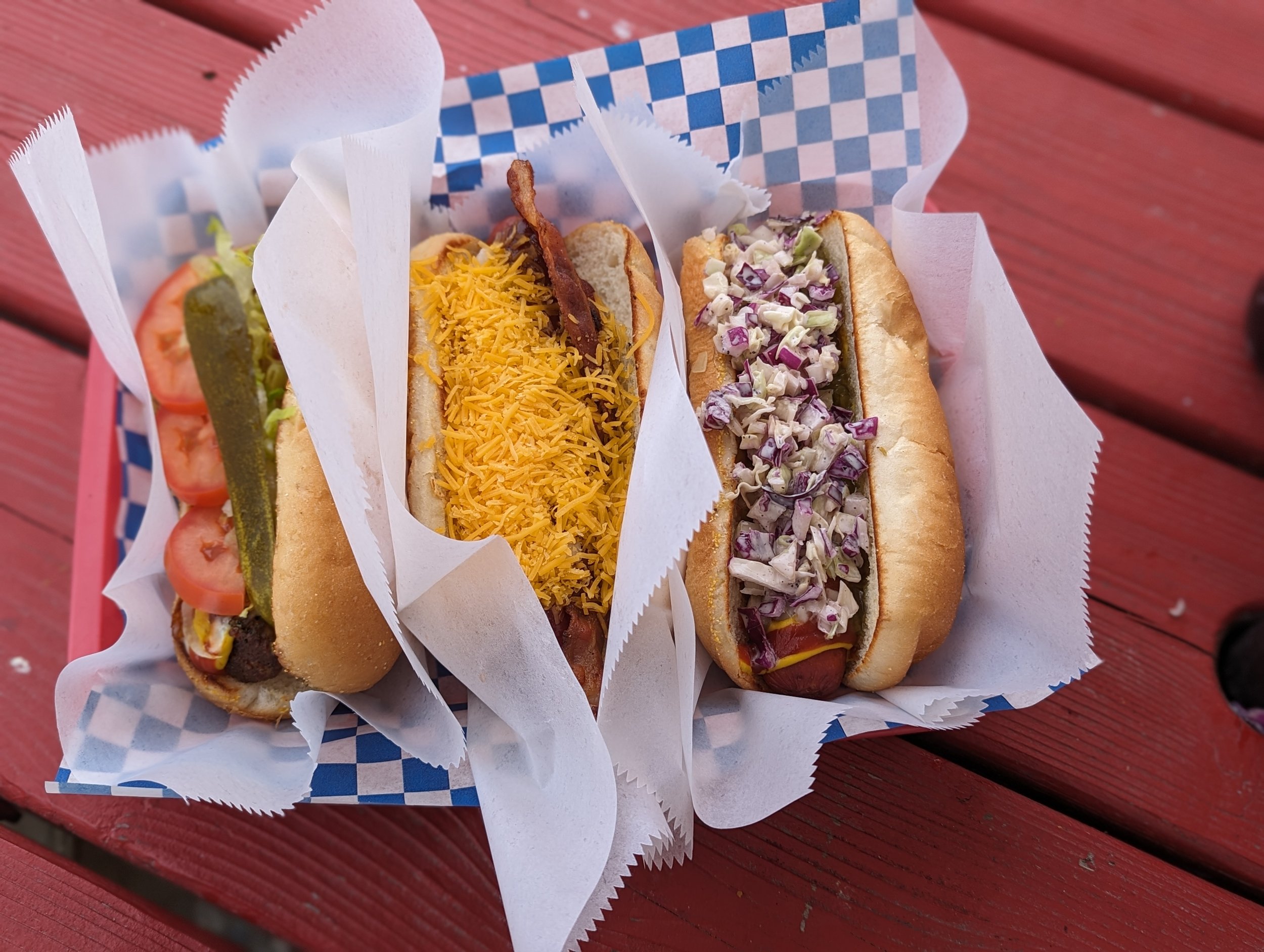   Dogs-A-Foot offerings from Left to right - Chiang Mai Dog (new menu), Memphis Dog (the special), Mumbo Jumbo with 