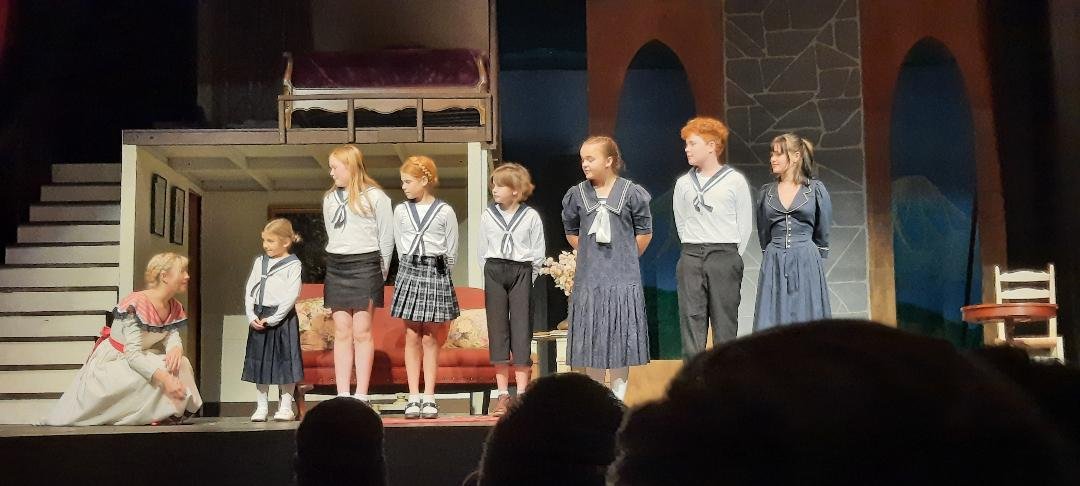   Left to right: Sophia Heistand, Ursula Adams-Doyle, Chloe Sampson, Aurelia Jones, Mira Grace, June Harper, Gus Parson, and Ember Parson. Photo by Kathie Meyer  