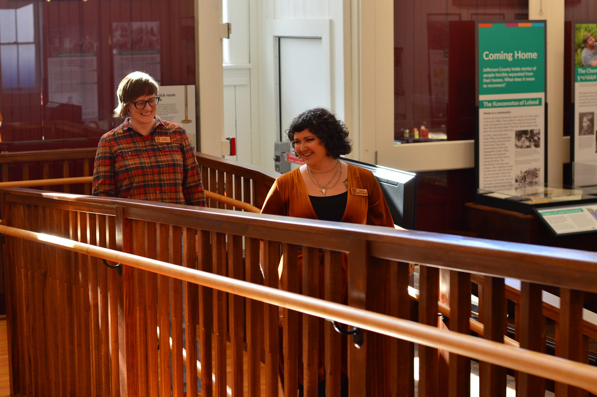  Ellie DiPietro and Davy Mack-Hazelwood walking up a wood railed ramp