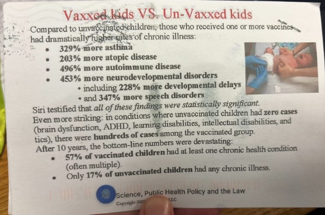 Photo of the anti-vaccination cards Hawley sent to families.