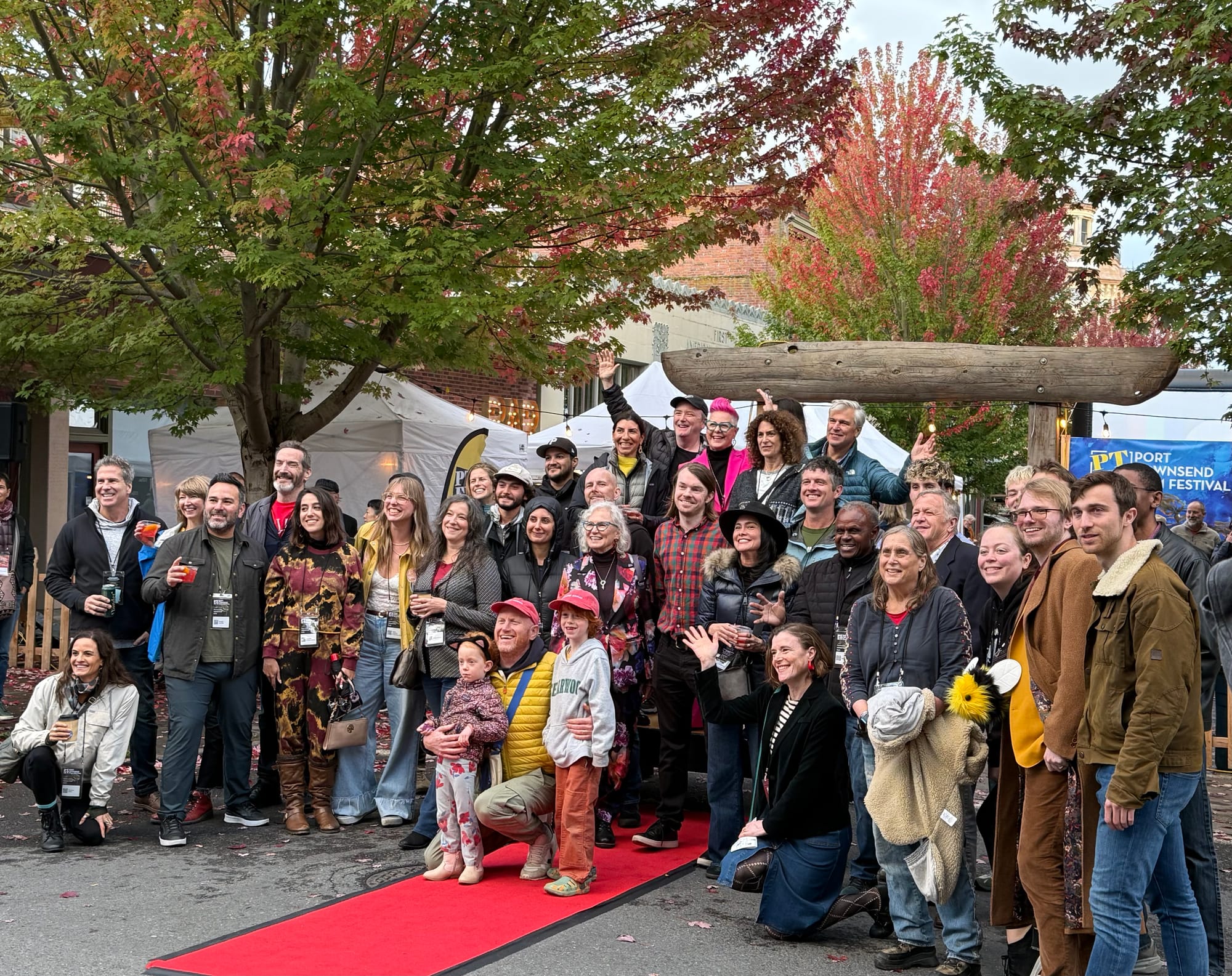 More than 30 filmmakers from around the world gather on Taylor Street in front of the red carpet. 