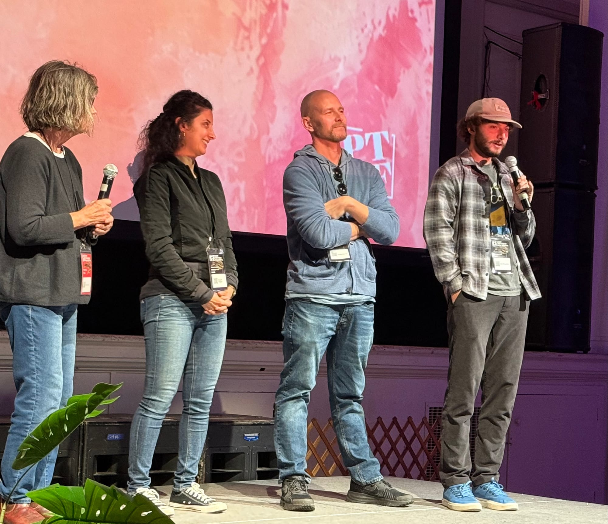 Festival documentary programmer Jane Julian, left, talks with filmmakers Roush Niaghi and Greg Morris along with the movie’s subject, Ali Allouche, far right. 