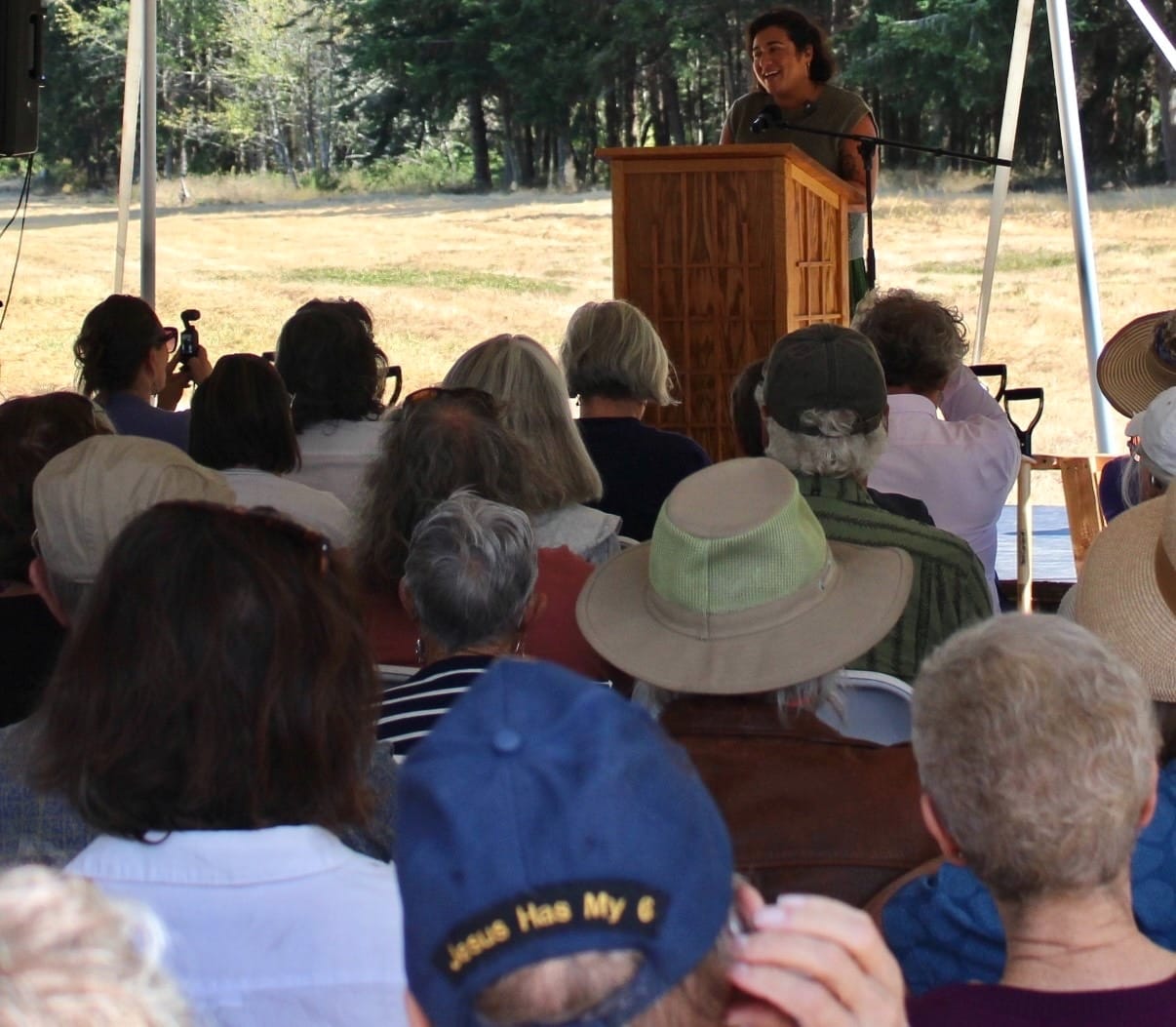 Representative Emily Randall addressing the crowd at the Habitat for Humanity groundbreaking ceremony.