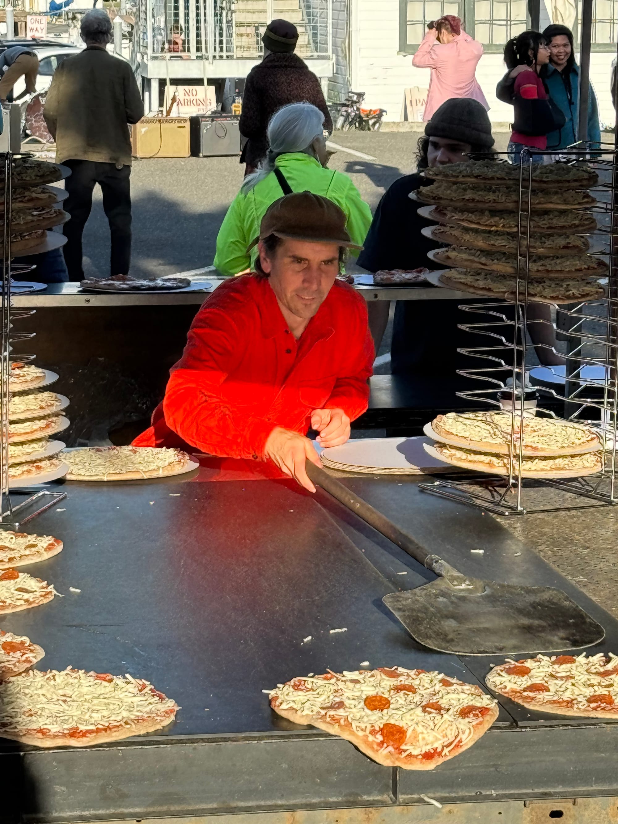 Flutter By Pizza Pie maker Mark Ennis making lots and lots of pizzas.