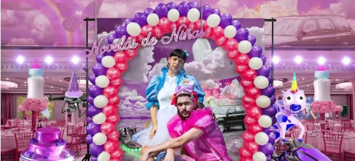 Liz Ferrer and Bow Ty, LIZN’BOW, in an arc of pink purple and white balloons