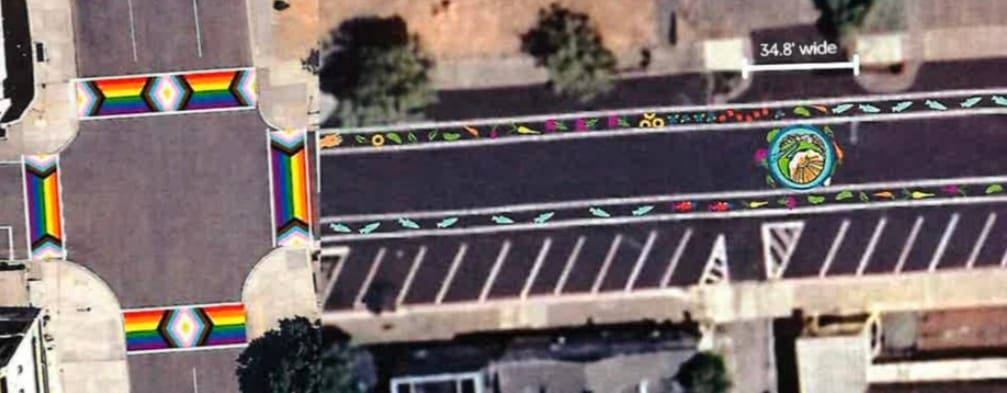 Rainbow sidewalks at the Lawrence and Tyler street intersection and a mandala in the farmers market area.