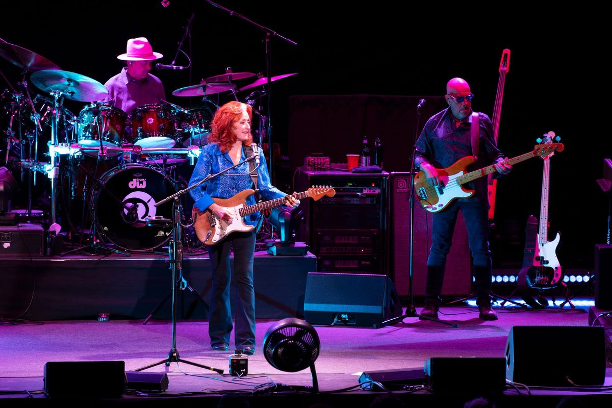 Bonnie Raitt, pictured with bassist James “Hutch” Hutchinson, right, and drummer Ricky Fataar, left. 