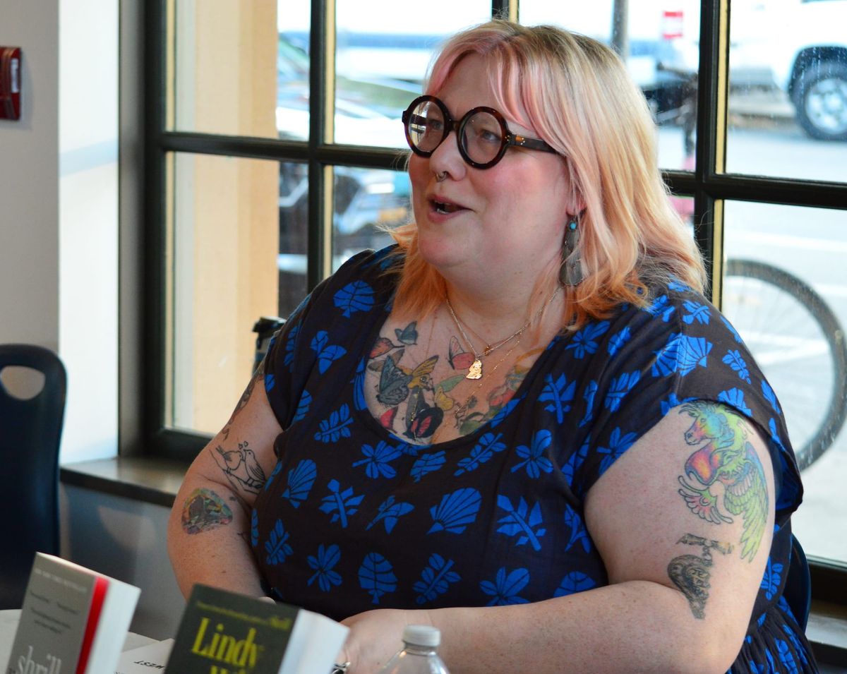 Lindy West signing books.