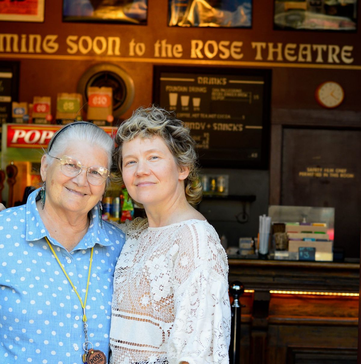 George Marie, right, with her mother Phyllis Owen standing in front of the popcorn counter at the Rose.