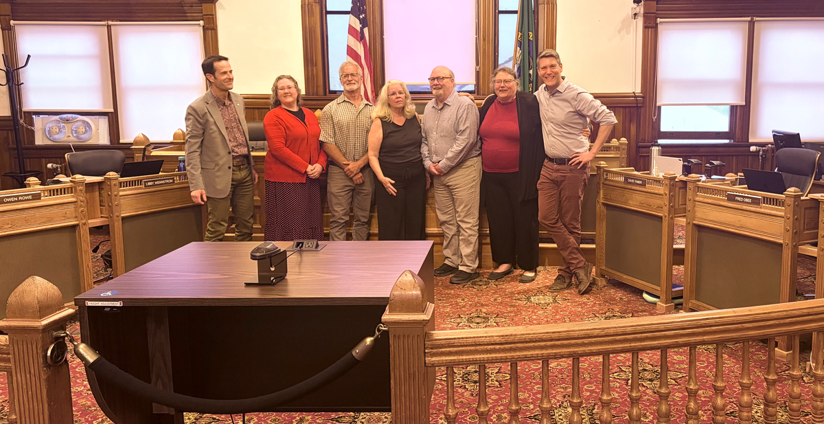 From left to right are outgoing City Manager John Mauro, Mayor Amy Howard, Councilmembers Neil Nelson, Monica MickHager, Fred Obee, Libby Wennstrom and David Faber.