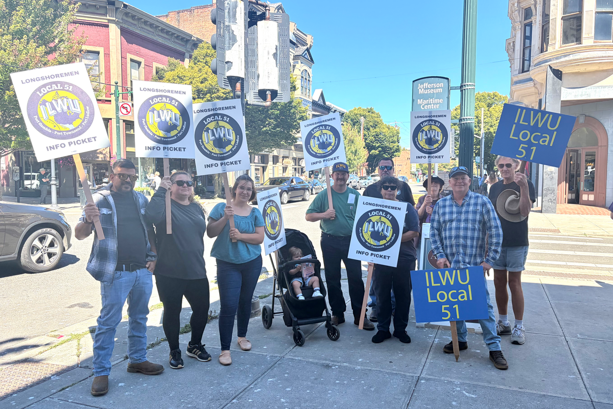 ILWU members with State Representative Candidate Kaylee Kuehn and community support holding picket signs in downtown Port Townsend. 