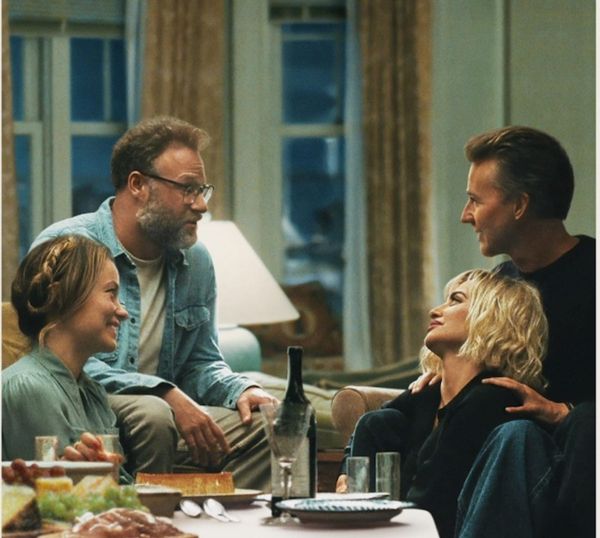 From left, Olivia Wilde, Seth Rogen, Penélope Cruz and Edward Norton, with a table of wine and food in the foreground.