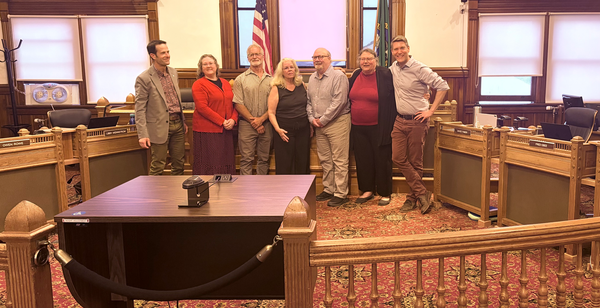 From left to right are outgoing City Manager John Mauro, Mayor Amy Howard, Councilmembers Neil Nelson, Monica MickHager, Fred Obee, Libby Wennstrom and David Faber.