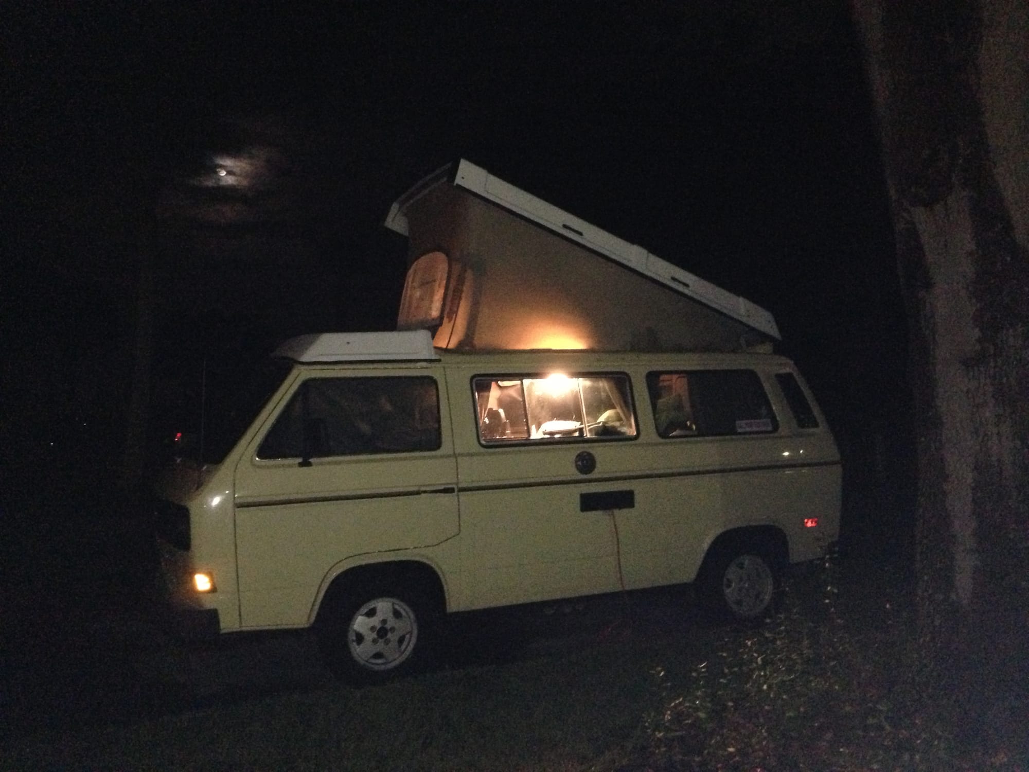 VW camper in the rain in the dark