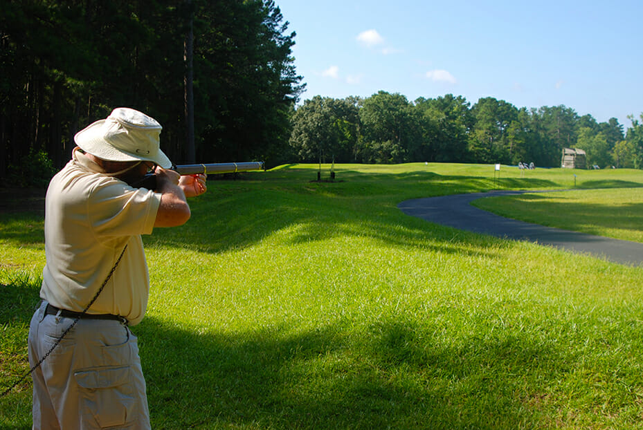Aiming wooden gun at fort