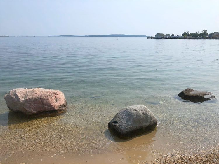 Rocks in shallows along shoreline