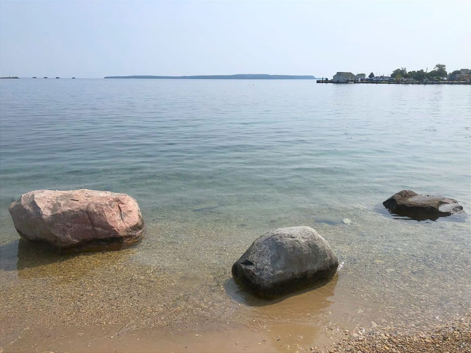 Rocks in shallows along shoreline
