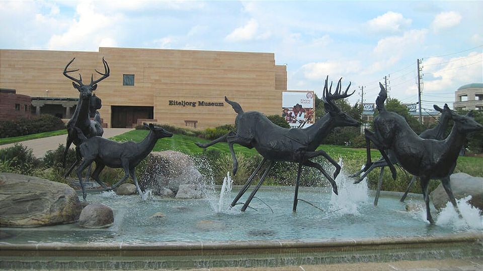 Deer sculptures racing across a fountain at the Eiteljorg Museum of American Indians and Western Art