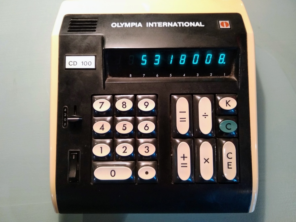 A vintage LED calculator displaying the number 5318008 for comedic effect.