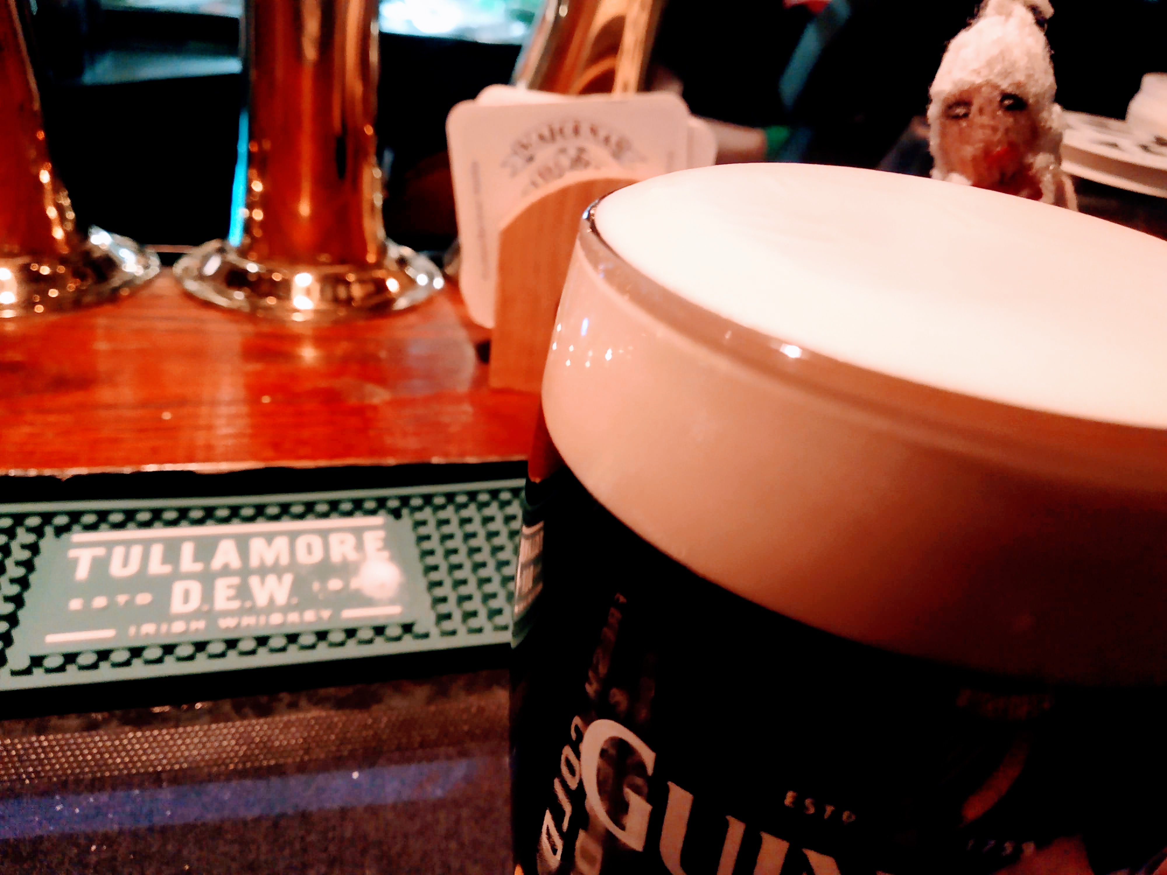 Puppet enjoying a pint of Guinness.