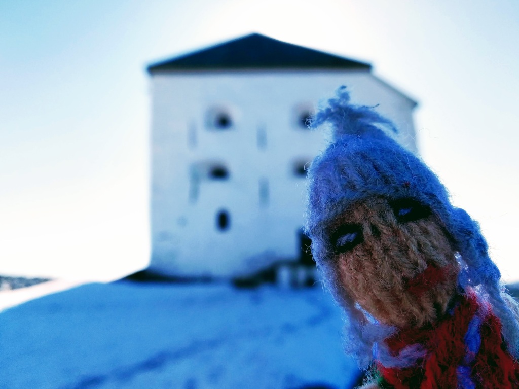 A Peruvian finger puppet enjoying a slight breeze at the Kristiansten Festning in Trondheim.