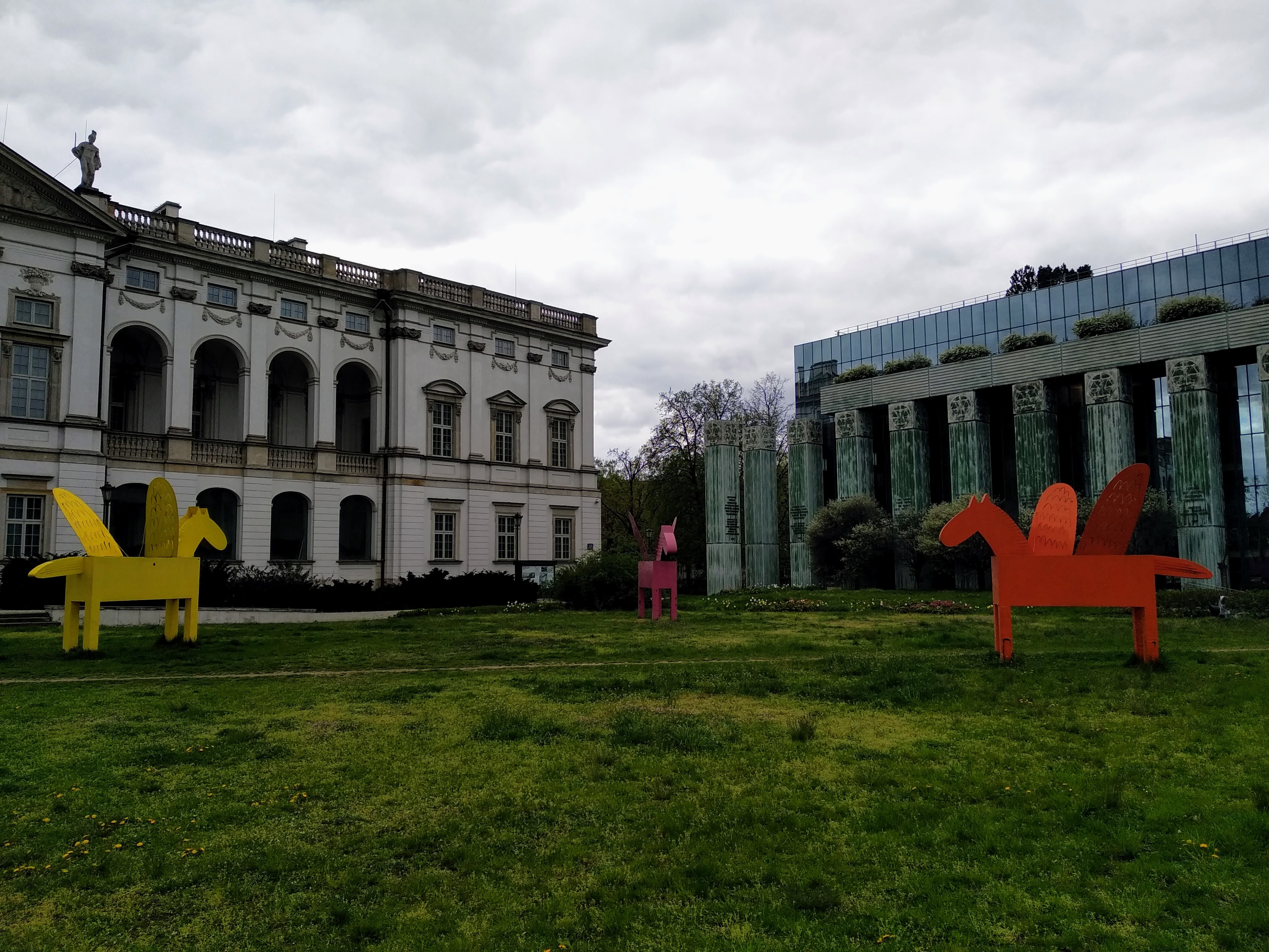 Flying coloured ponies in front of the Krasiński Palace.