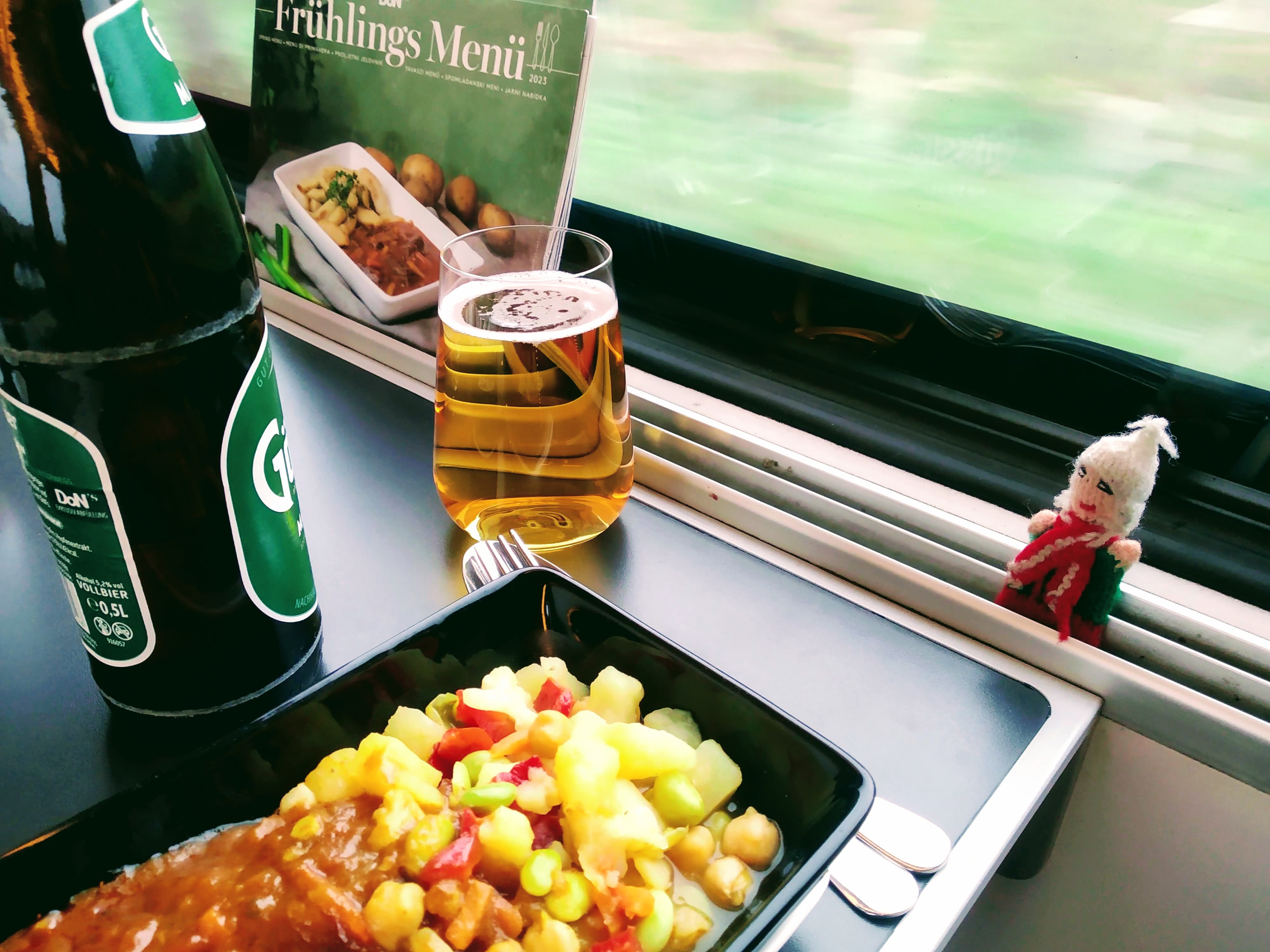 Potato and chickpea curry with a pint of Gösser Märzen. And a finger puppet.
