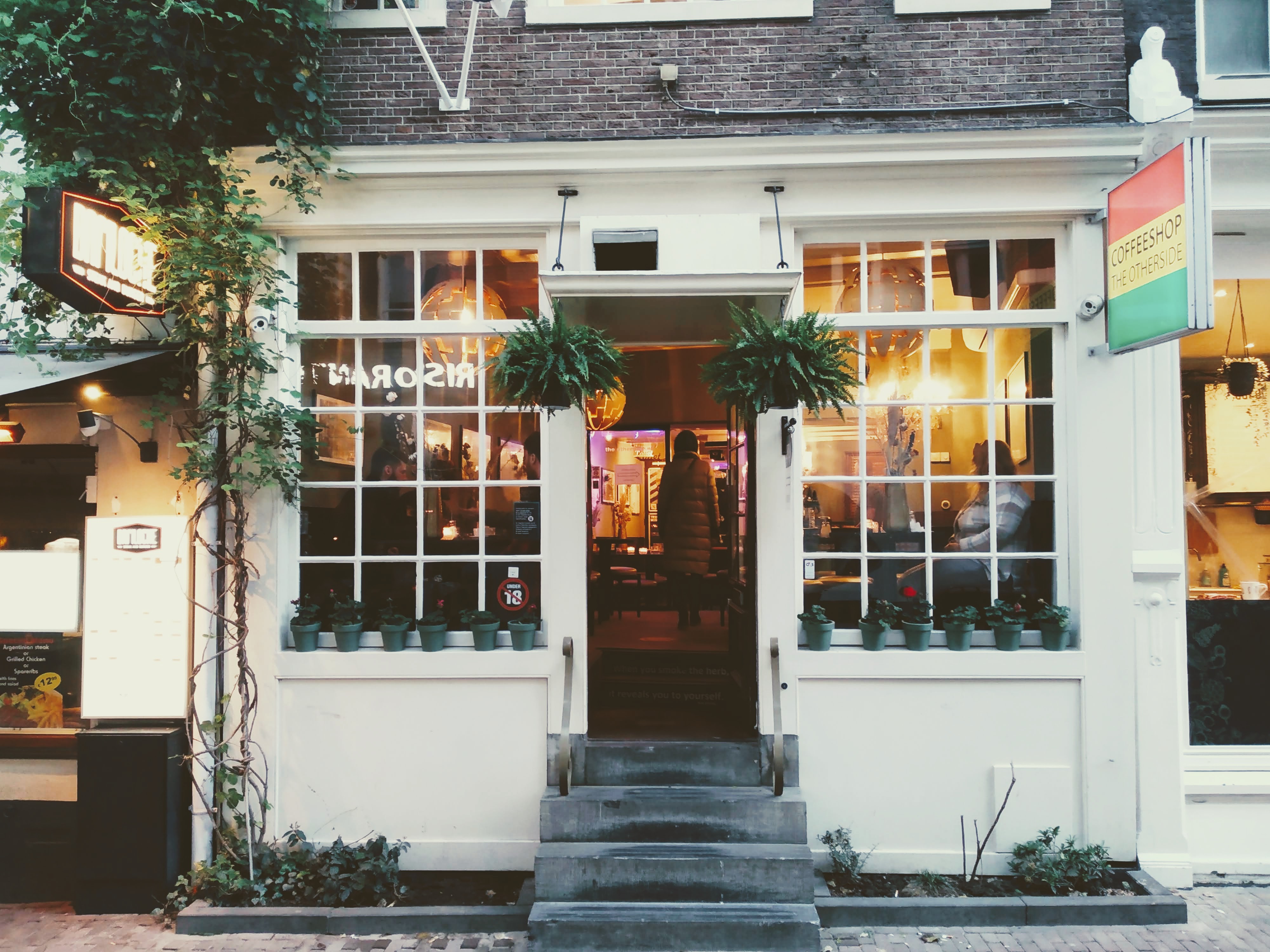 Door to a coffee shop in central Amsterdam.