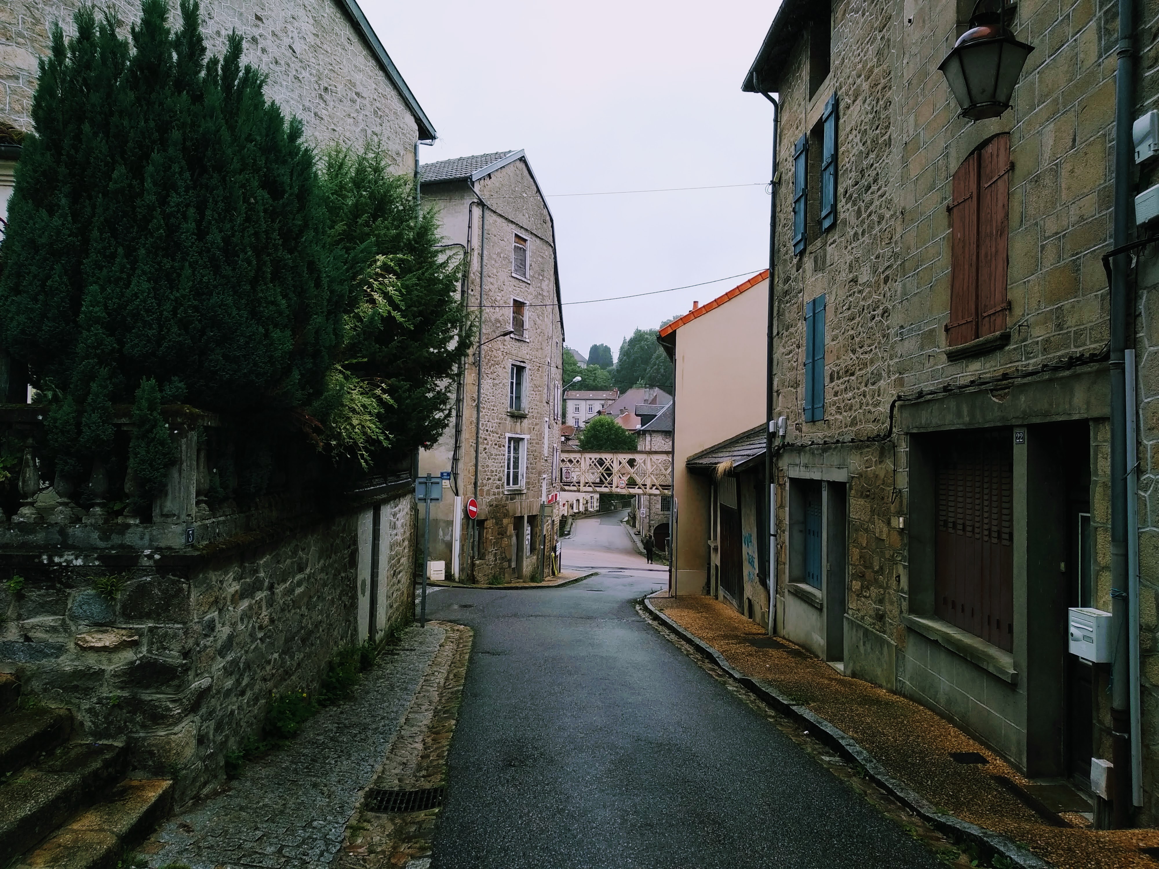 A view down a narrow street in Eymoutiers, France.