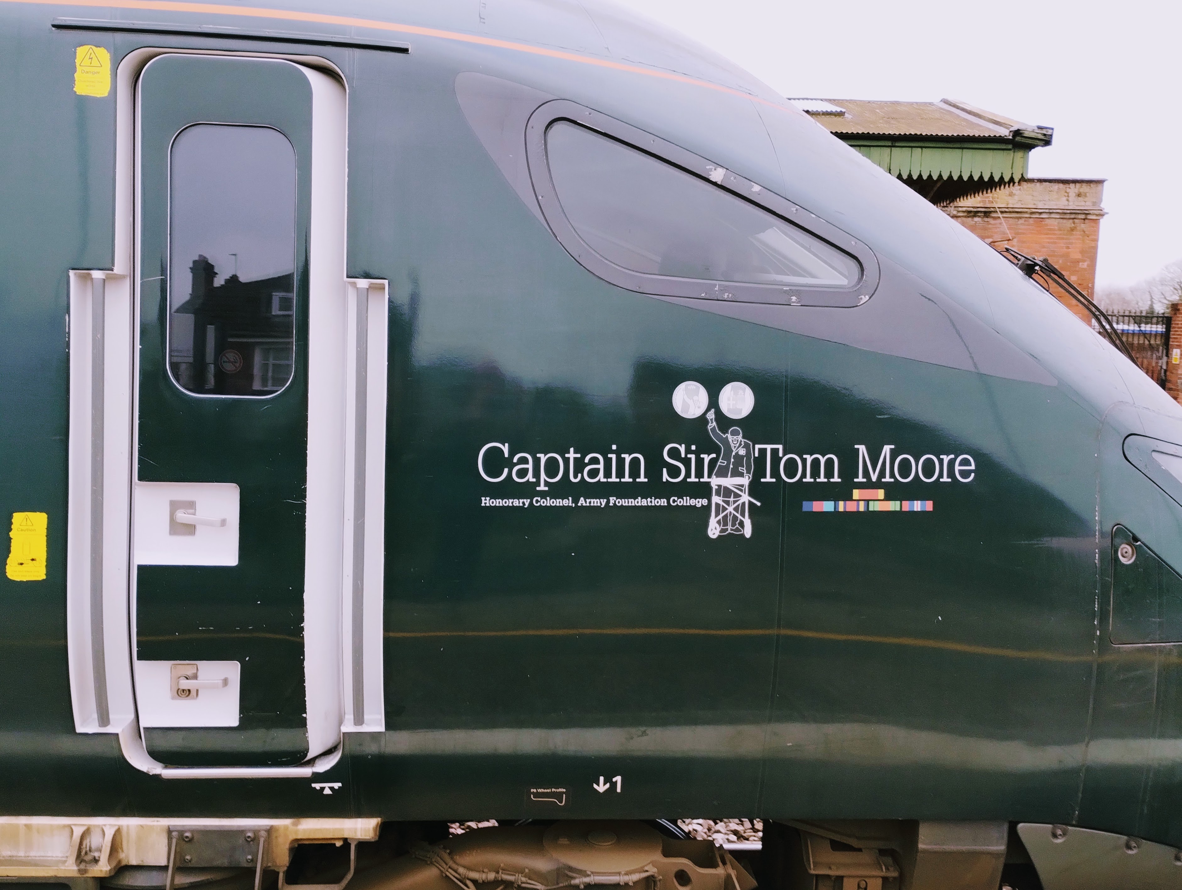 Photograph of the driver's door into the power car of the Captain Sir Tom Moore locoomotive.