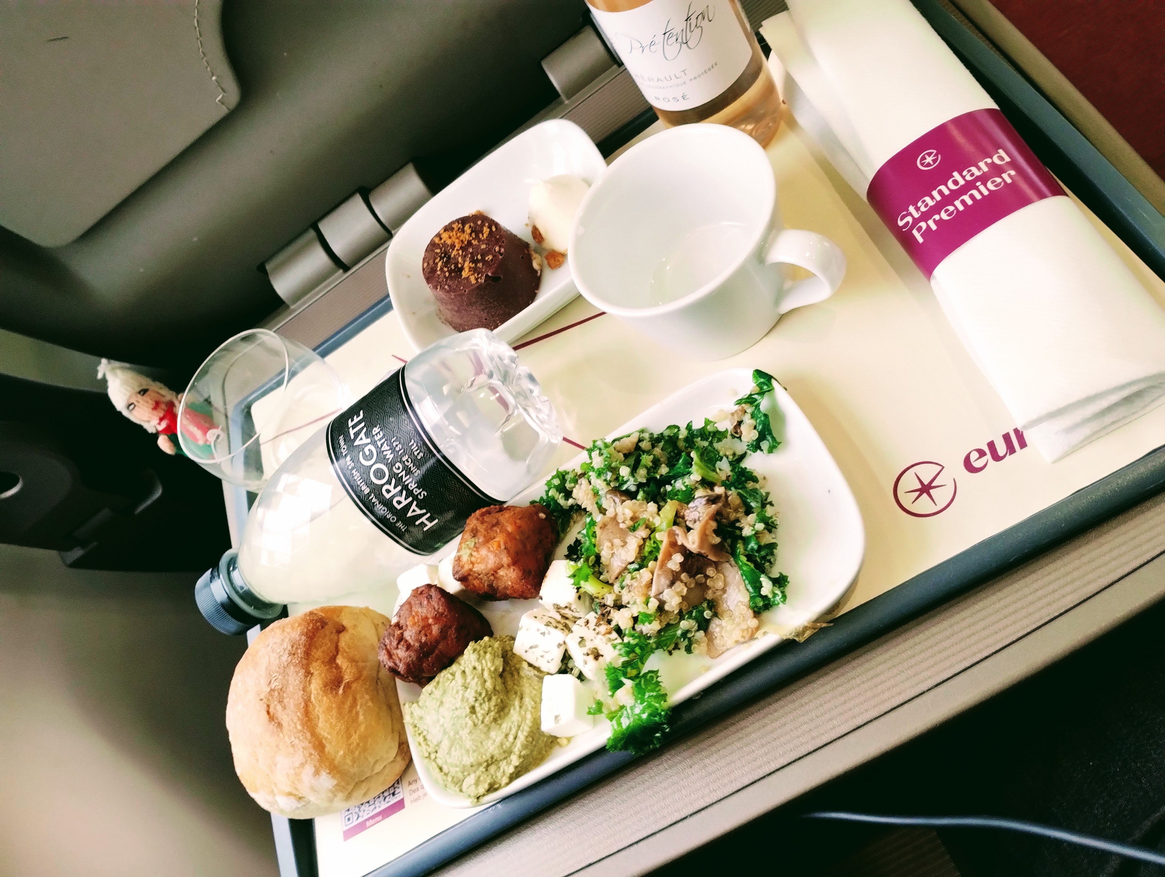 A puppet enjoying a complimentary meal of feta with green stuff, falafels and humus, as served in Standard Premier aboard the Eurostar.