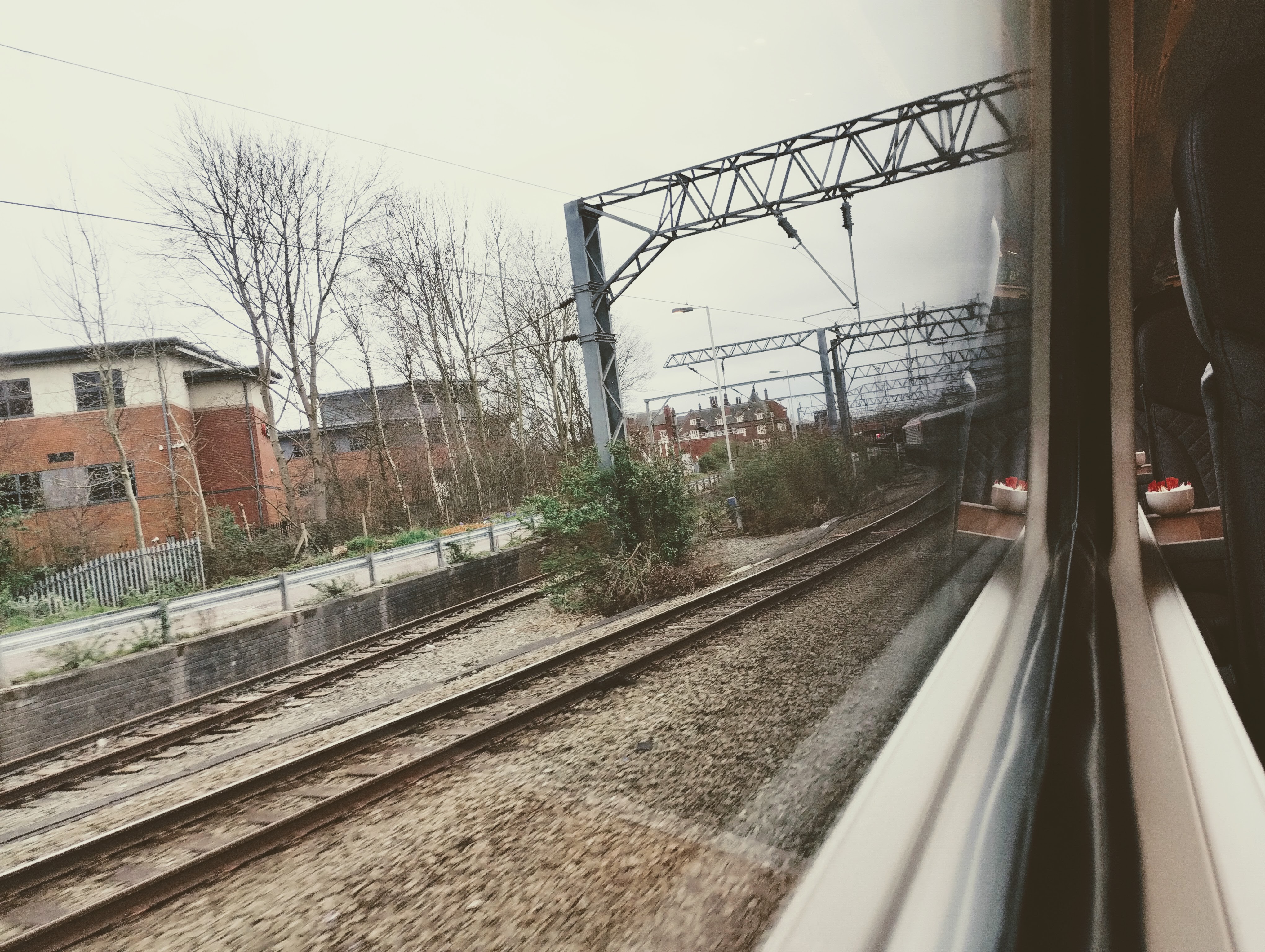 Photograph of housing taken from a train approaching the station at Crewe.
