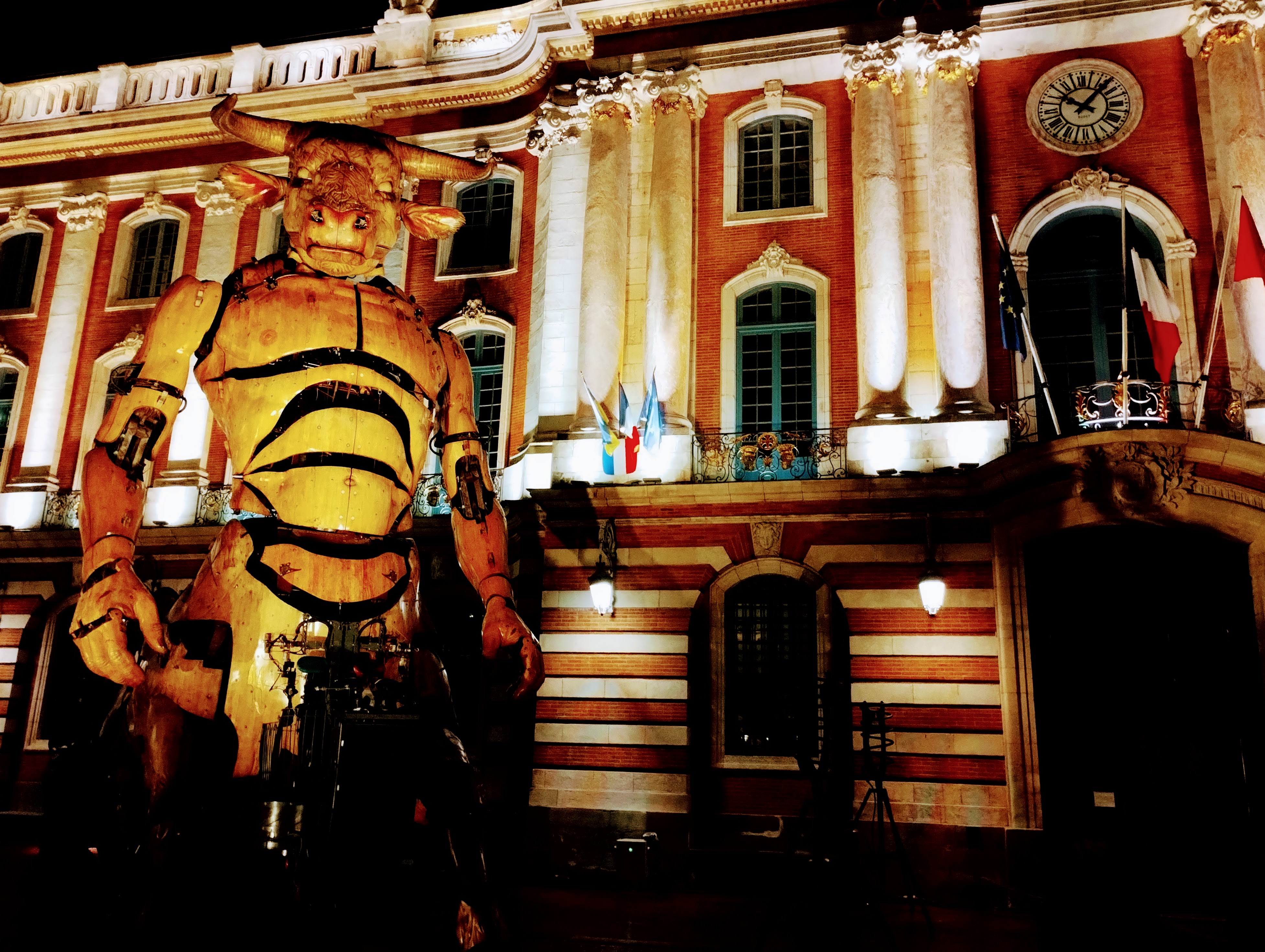 A close up of a mechanical minotaur looking directly at the camera.