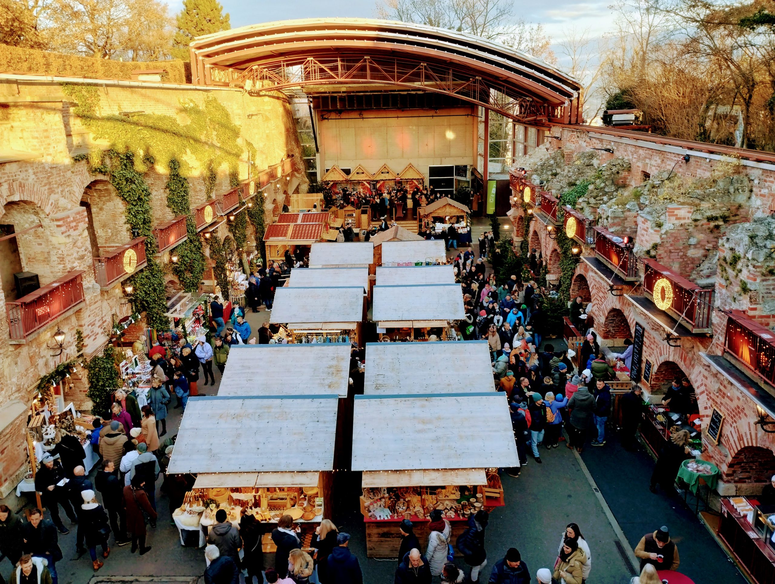 A cosy Christmas market in an open-air theatre.