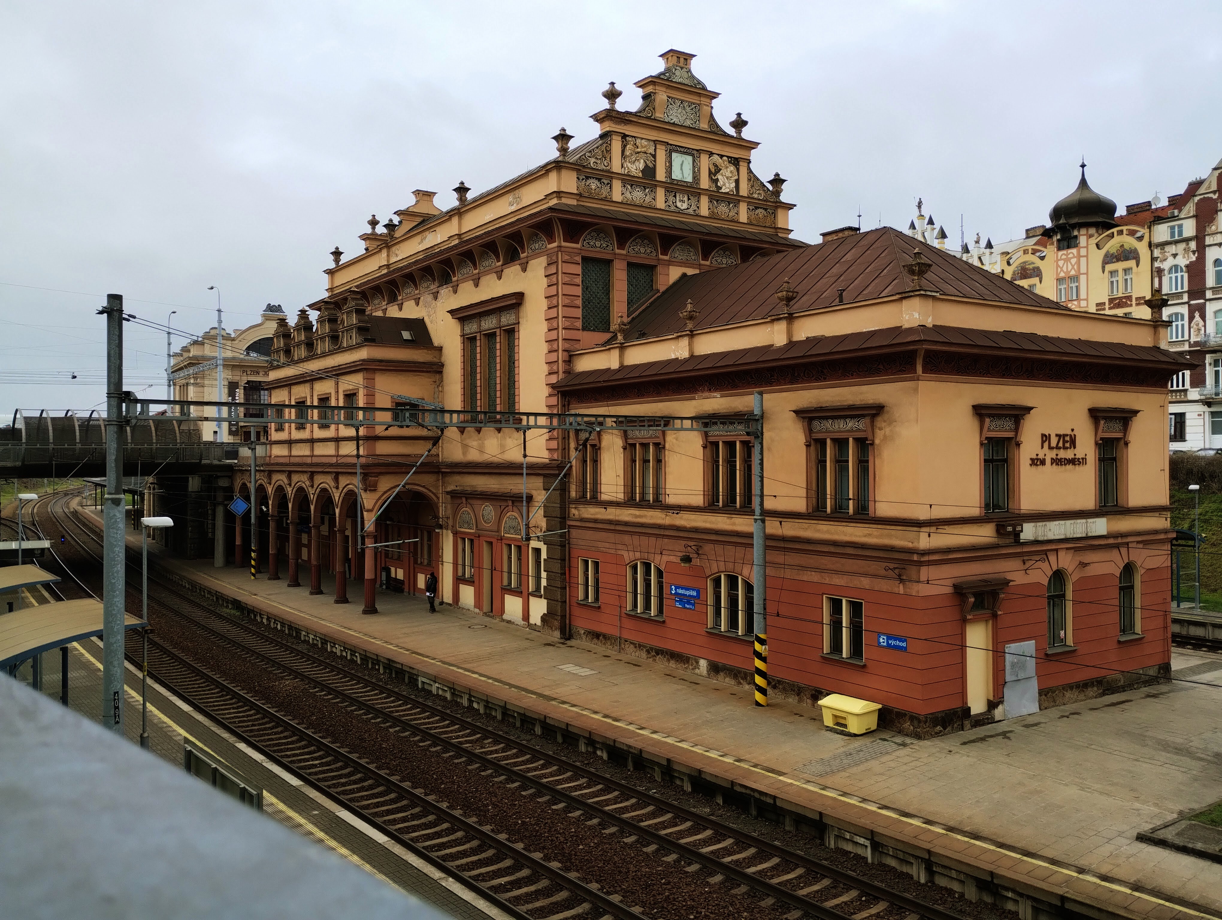Plzeň-Jižní Předměstí station is an ornate terracotta and pale-yellow building in the neo-Renaissance style.