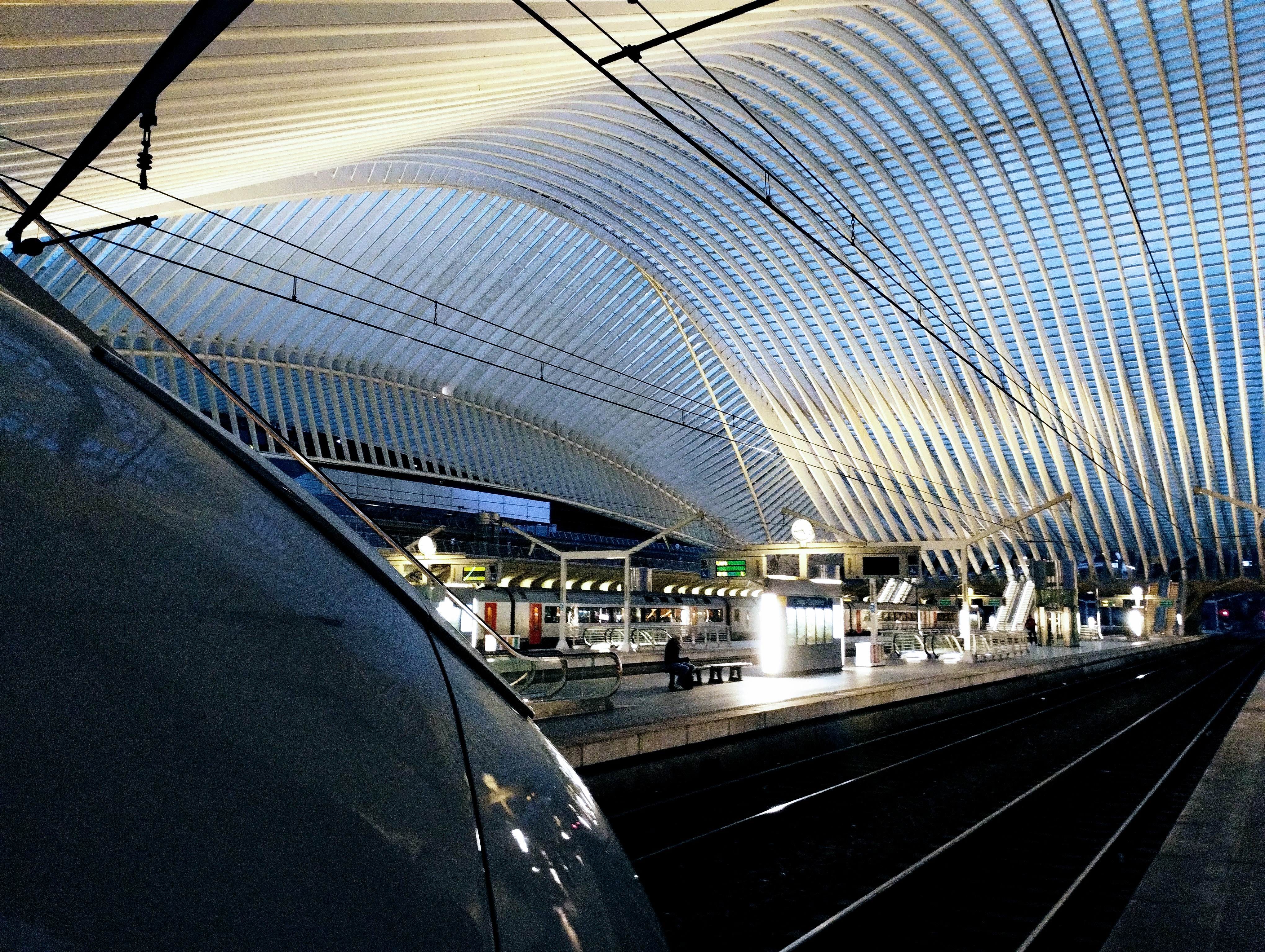 In the evening, the pointy end of an ICE3 inside the Calatrava-designed station of Liège Guillemins