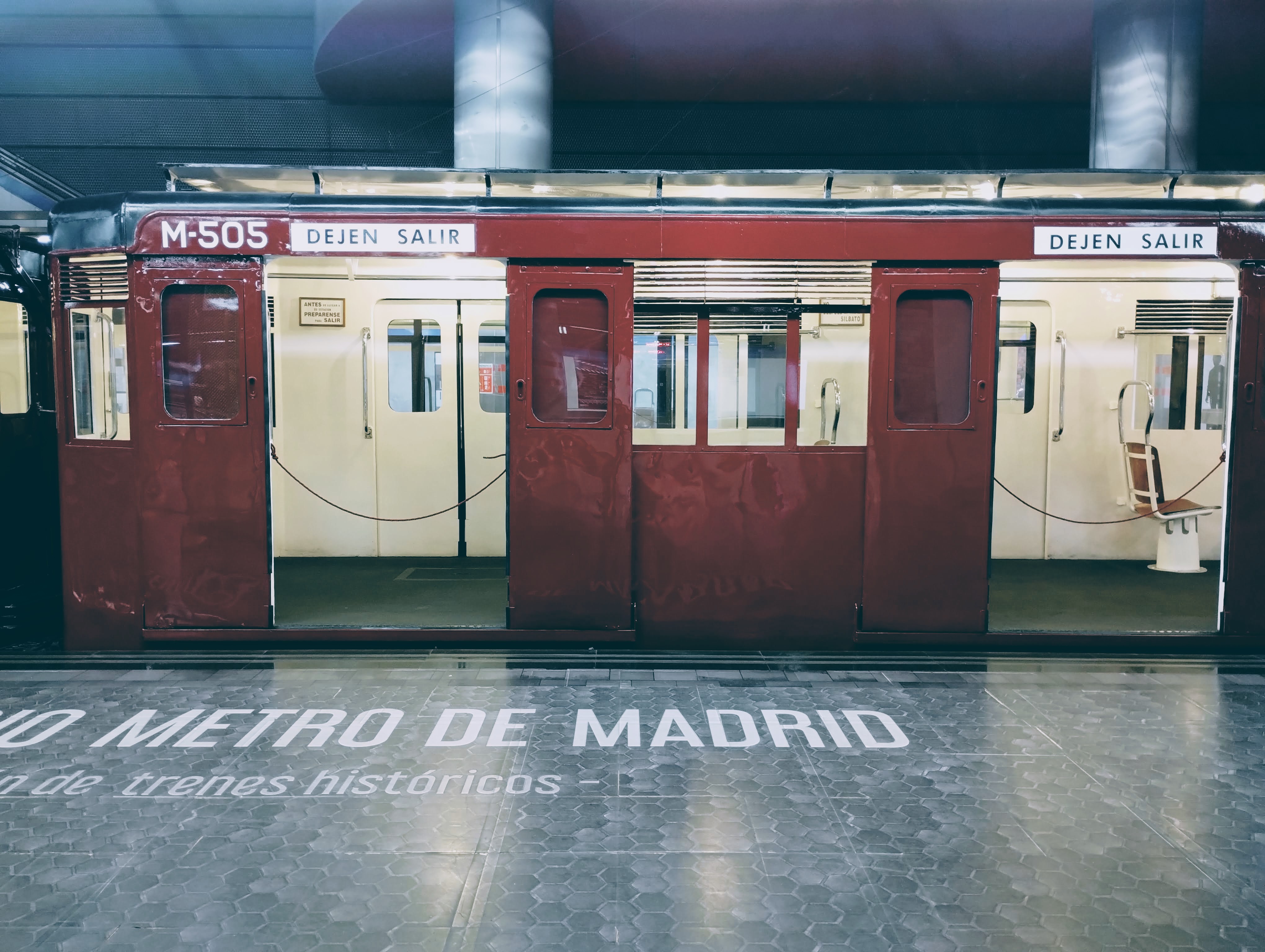 Open doors to a historic metro carriage.