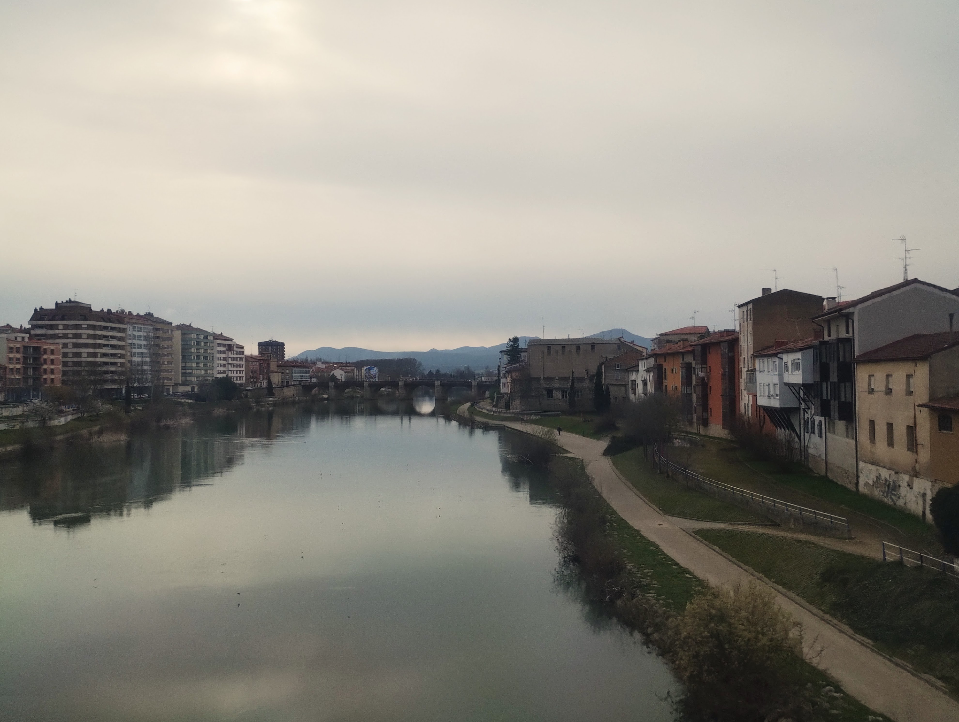 A view of a river from a railway bridge.