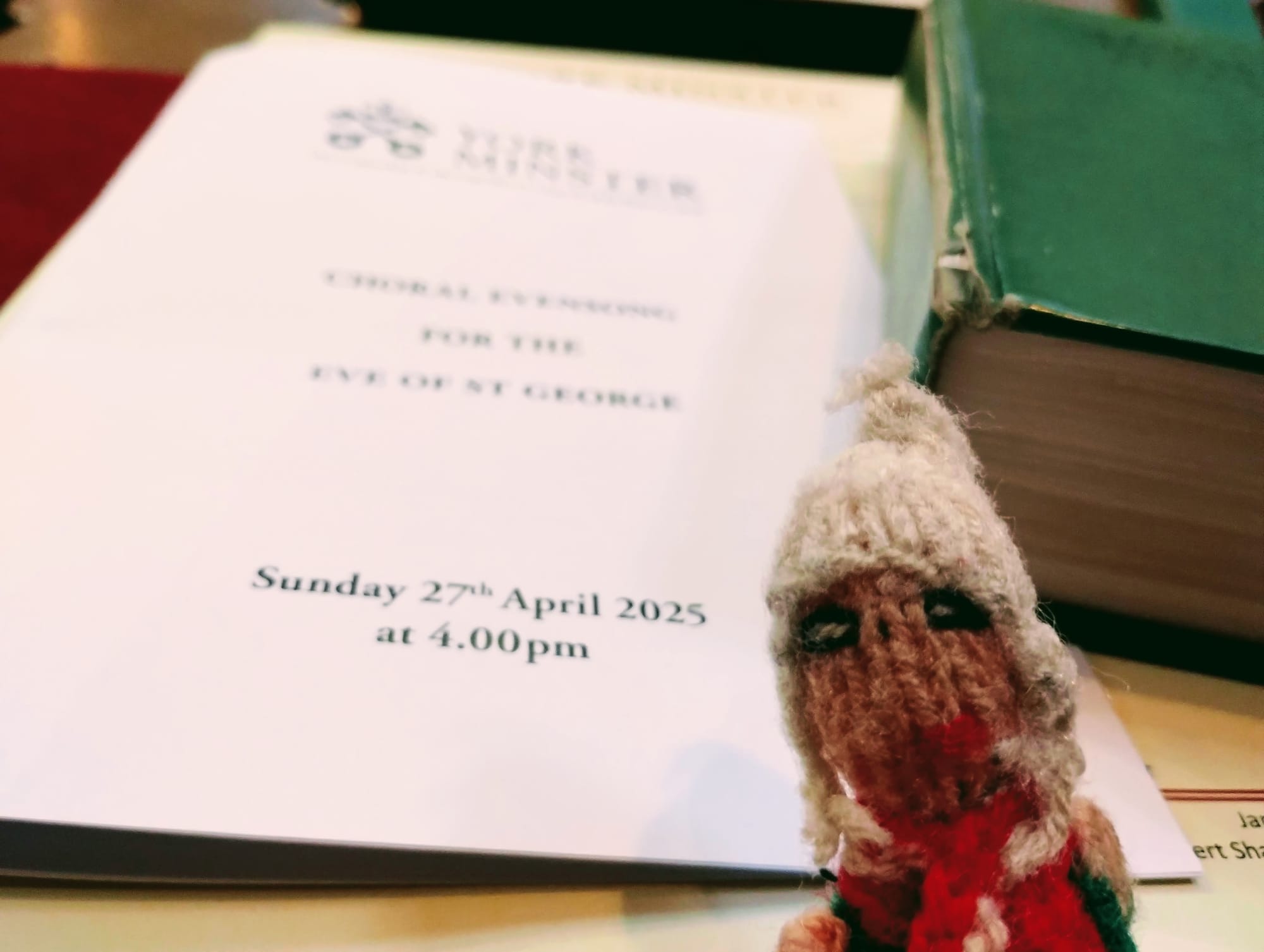 Puppet reading the order of service for Evensong at York Minster.