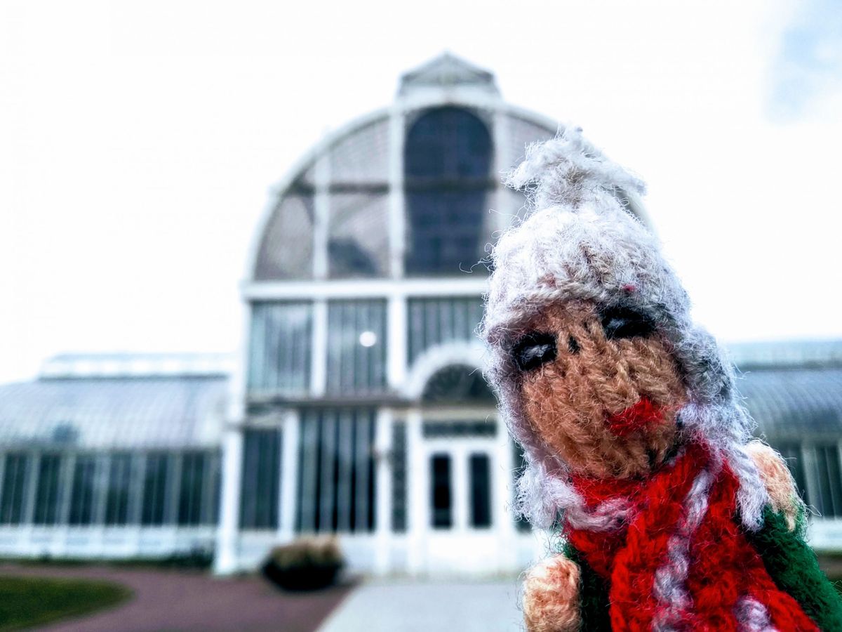 Puppet poses provocatively in front of the palm house of Gothenburg's Trädgårdsföreningen
