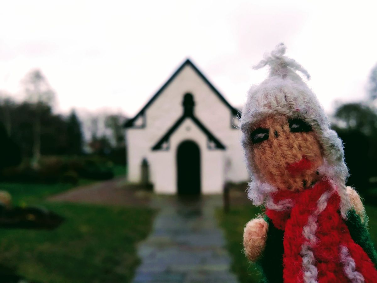 The world's smallest woollen explorer in front of Denmark's smallest church.