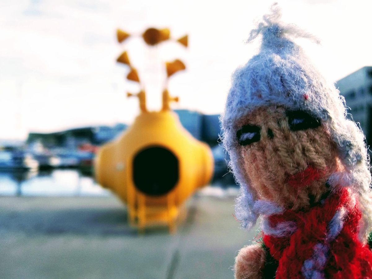 Puppet admires "What does the Fjord Say?", an art installation inspired by the Beatles Yellow Submarine.