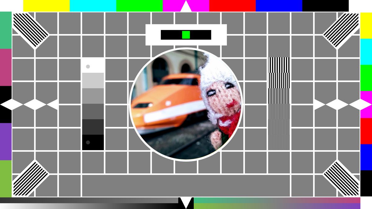 A place-holder image of a TV test card, with finger puppet and a TGV in the centre.