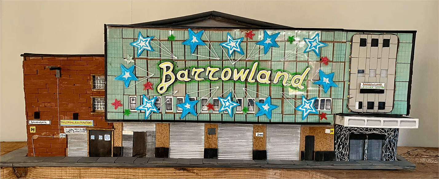A miniature model of the Barrowland Ballroom in Glasgow with neon stars and signs
