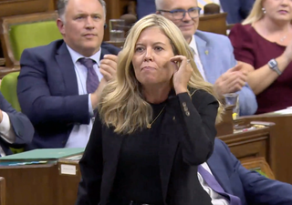 A woman speaks during a sitting of the House of Commons