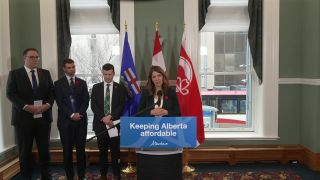 Premier Danielle Smith speaks at a news conference.